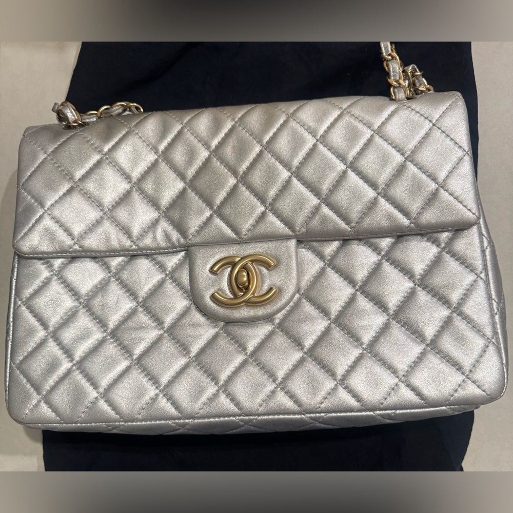 Silver Authentic Chanel Jumbo Bag.